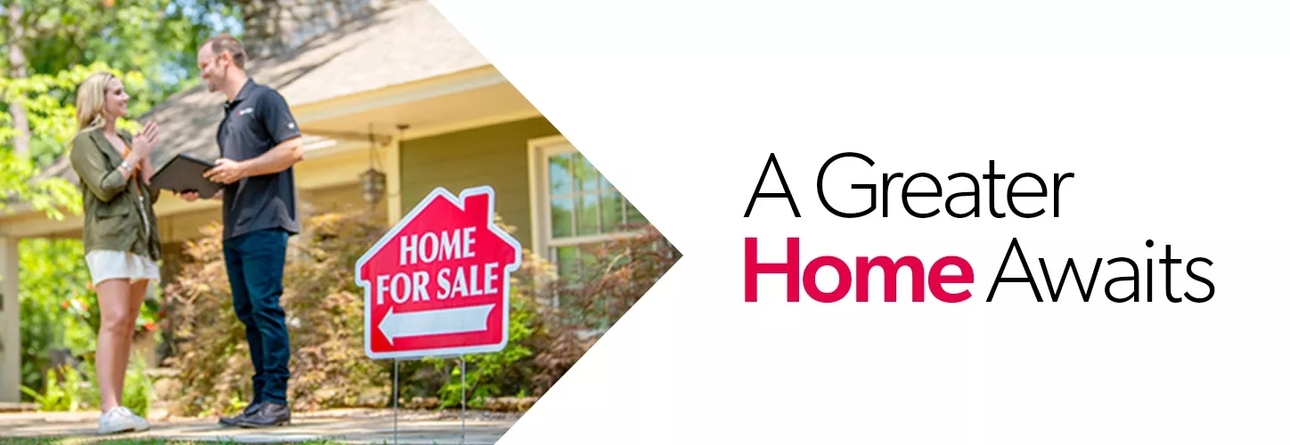 A man and a woman discussing a potential property for sale in front of them behind a "Home for Sale" sign.